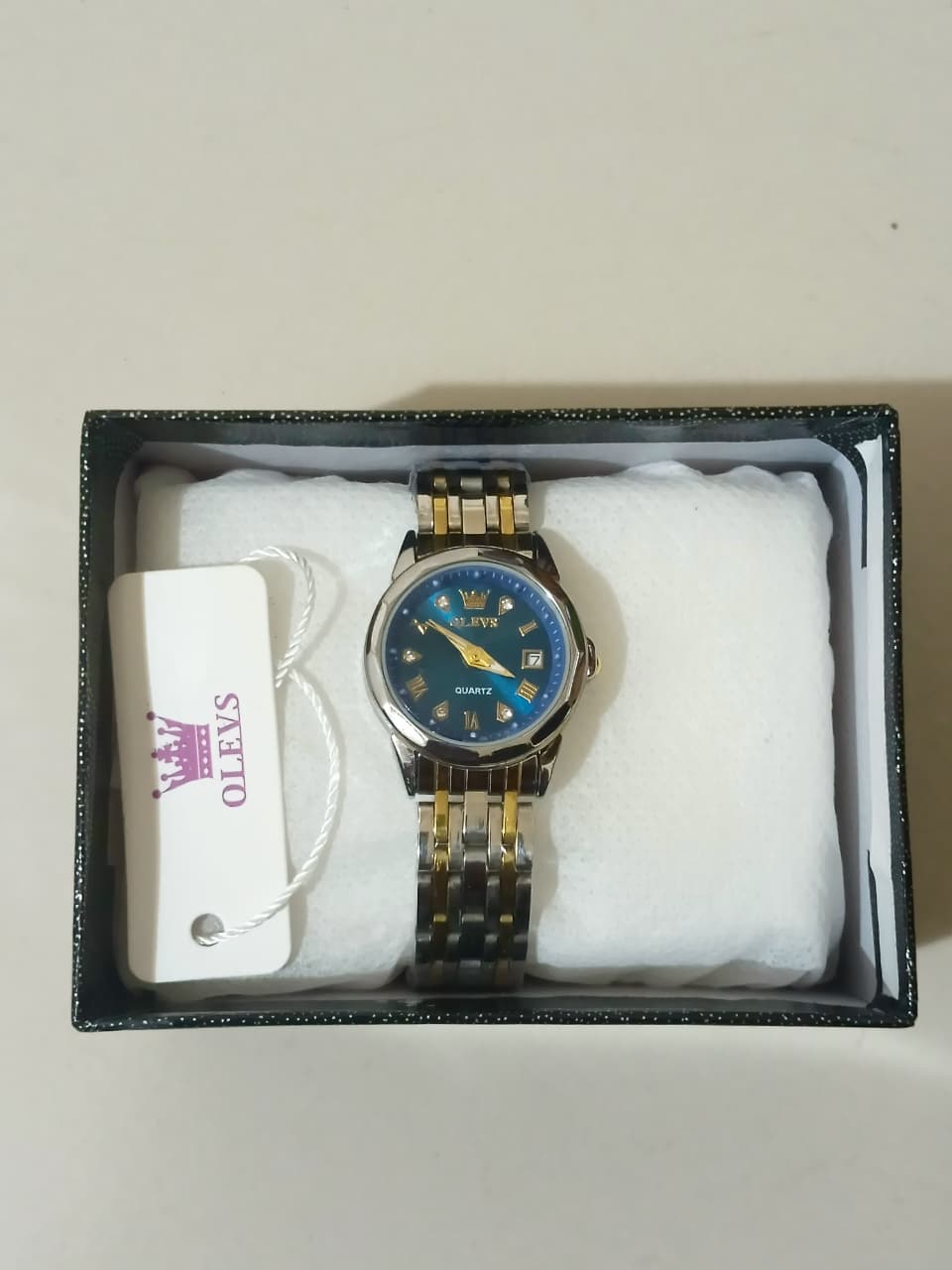 Woman OLEVS Luxury Stainless Steel Quartz Watch