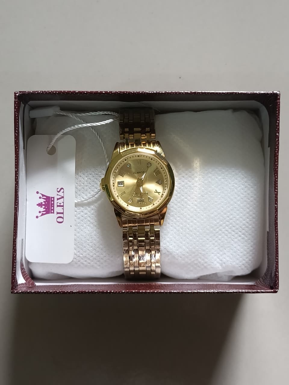 Woman OLEVS Luxury Stainless Steel Quartz Watch