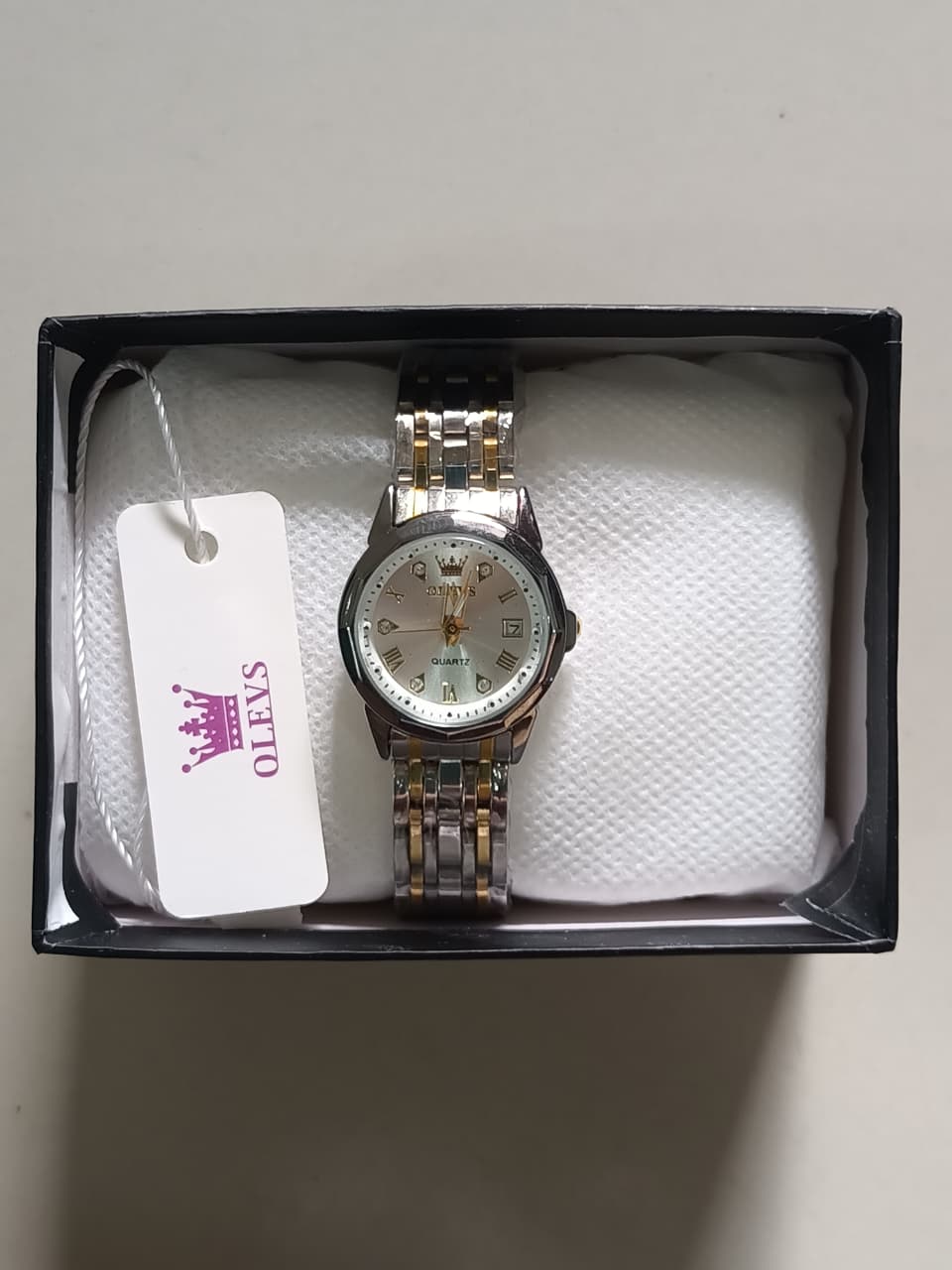 Woman OLEVS Luxury Stainless Steel Quartz Watch