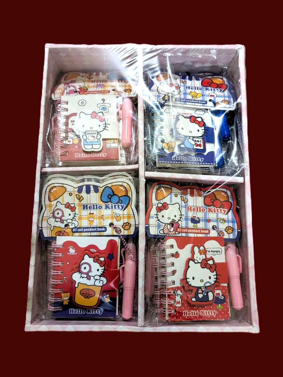 Hello Kitty A7 Mini Spiral Notebook with Pen – 4 Pieces Set